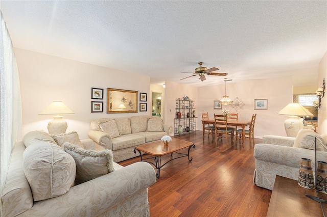9065 SW 82nd Ter Unit G, Ocala, FL 34481 - living room with a ceiling fan, wood finished floors, and a textured ceiling