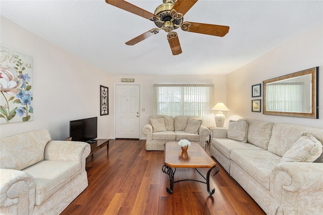 9065 SW 82nd Ter Unit G, Ocala, FL 34481 - living area featuring ceiling fan and dark wood-style floors