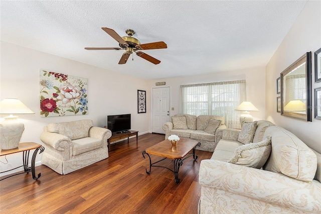 9065 SW 82nd Ter Unit G, Ocala, FL 34481 - living area with dark wood-style flooring and ceiling fan