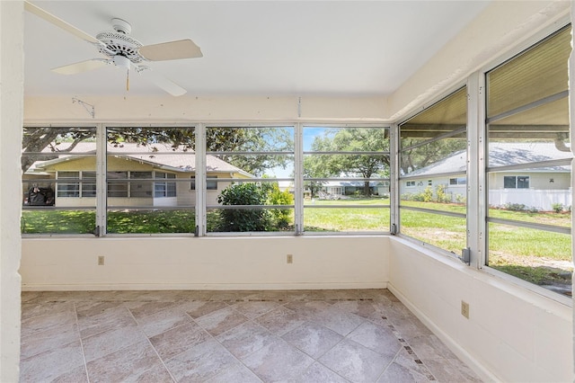 9065 SW 82nd Ter Unit G, Ocala, FL 34481 - unfurnished sunroom featuring ceiling fan