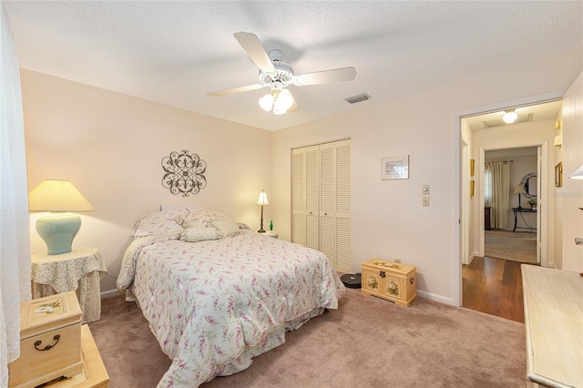 9065 SW 82nd Ter Unit G, Ocala, FL 34481 - bedroom featuring a closet, carpet flooring, and ceiling fan
