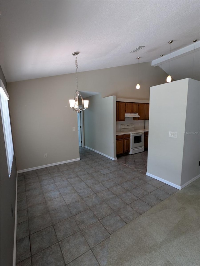 3650 SE 55th Ct, Ocala, FL 34480 - unfurnished living room featuring a chandelier, a textured ceiling, high vaulted ceiling, and dark tile patterned floors