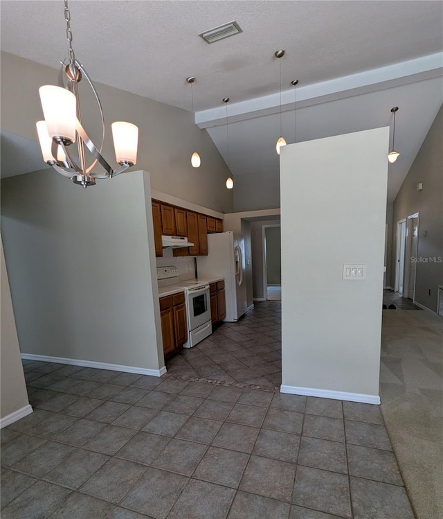 3650 SE 55th Ct, Ocala, FL 34480 - kitchen featuring white appliances, under cabinet range hood, a chandelier, light countertops, and hanging light fixtures