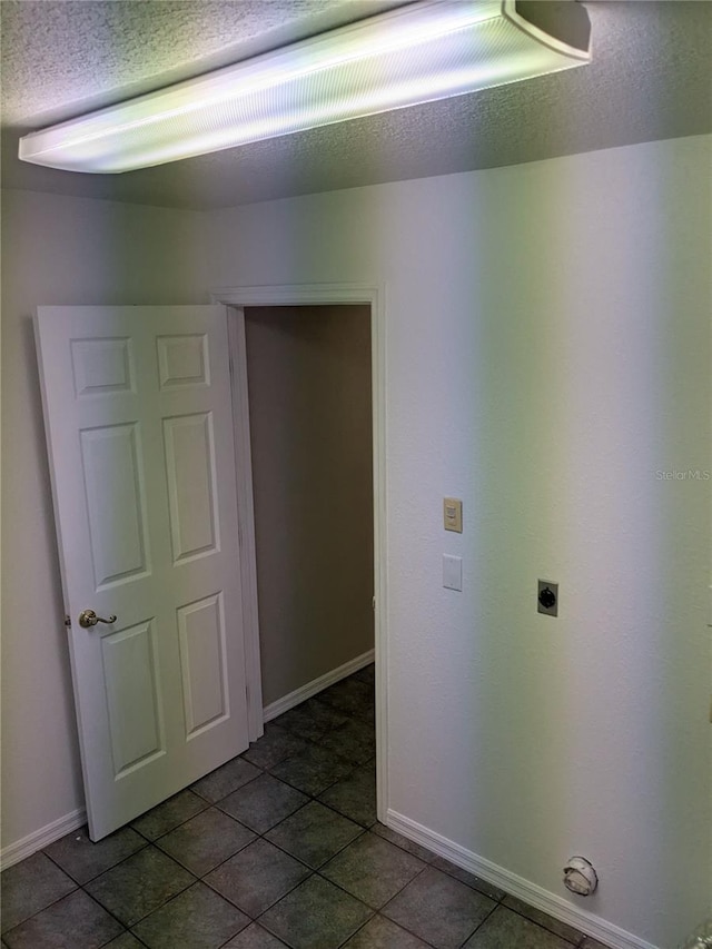 3650 SE 55th Ct, Ocala, FL 34480 - spare room featuring a textured ceiling and tile patterned floors