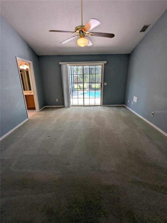 3650 SE 55th Ct, Ocala, FL 34480 - unfurnished room featuring a ceiling fan, light colored carpet, a textured ceiling, and vaulted ceiling