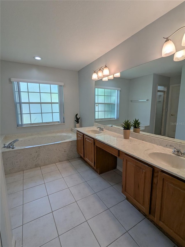 3650 SE 55th Ct, Ocala, FL 34480 - bathroom featuring plenty of natural light, double vanity, tile patterned flooring, and recessed lighting