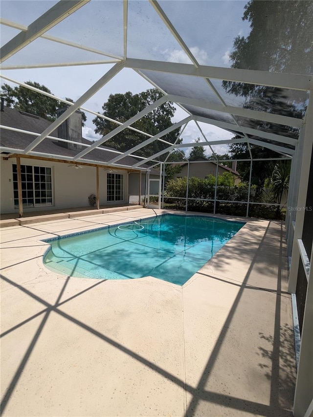 3650 SE 55th Ct, Ocala, FL 34480 - swimming pool featuring a patio and glass enclosure