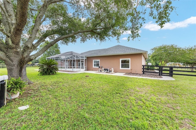 7220 NW 83rd Ter, Ocala, FL 34482 - rear view of property with stucco siding, a patio, and a fenced backyard