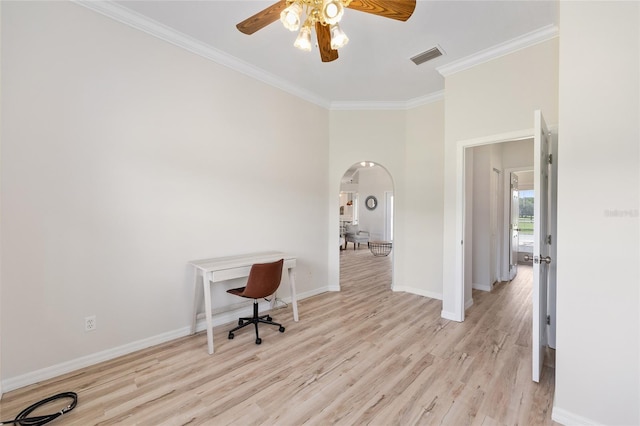 7220 NW 83rd Ter, Ocala, FL 34482 - unfurnished office with arched walkways, ceiling fan, ornamental molding, light wood-style flooring, and a high ceiling