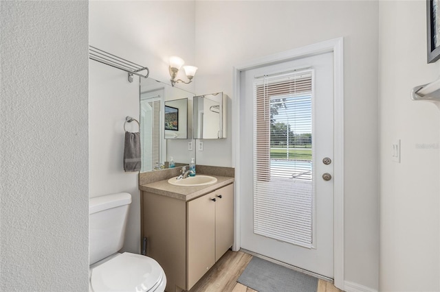 7220 NW 83rd Ter, Ocala, FL 34482 - bathroom with vanity and wood finished floors