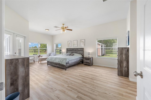 7220 NW 83rd Ter, Ocala, FL 34482 - bedroom featuring light wood-style floors and ceiling fan