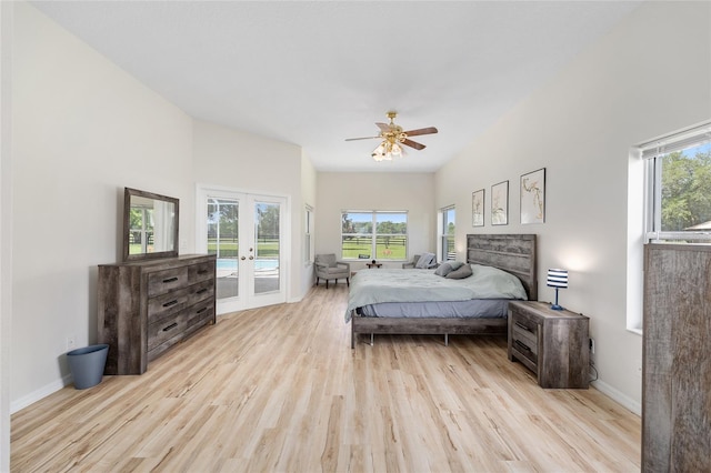 7220 NW 83rd Ter, Ocala, FL 34482 - bedroom with french doors, access to outside, light wood finished floors, and multiple windows