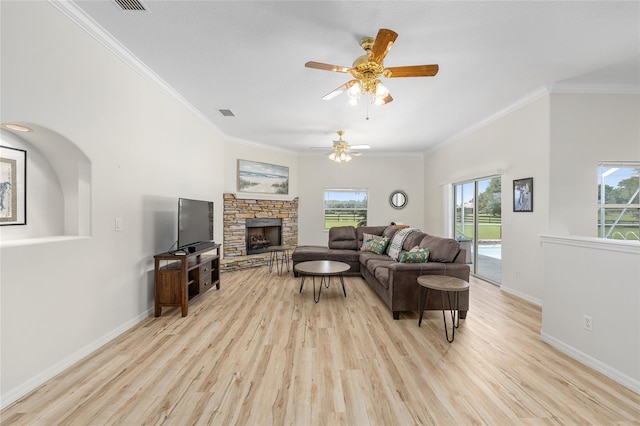 7220 NW 83rd Ter, Ocala, FL 34482 - living room featuring light wood-type flooring, healthy amount of natural light, and crown molding