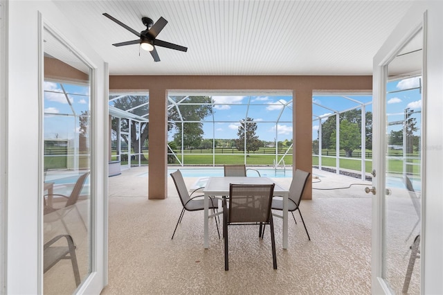 7220 NW 83rd Ter, Ocala, FL 34482 - sunroom / solarium with a ceiling fan, outdoor dining area, and healthy amount of natural light