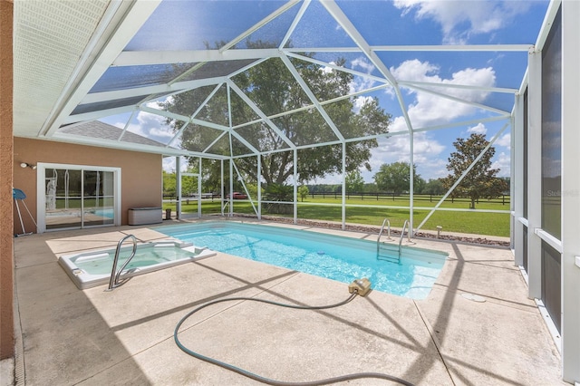 7220 NW 83rd Ter, Ocala, FL 34482 - view of pool with a patio area, a lanai, a pool with connected hot tub, and a yard