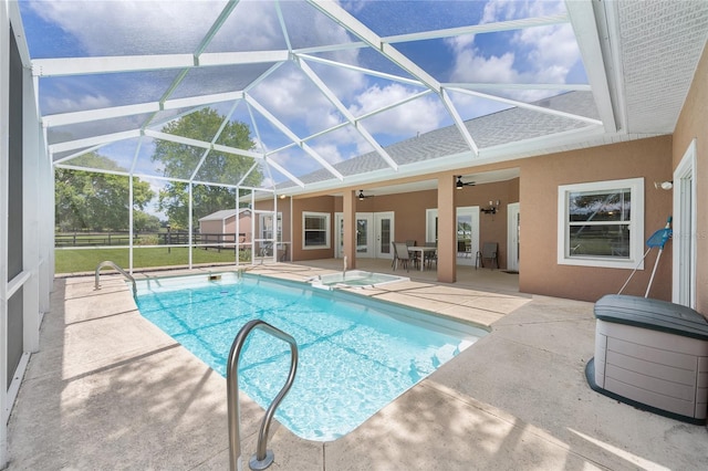 7220 NW 83rd Ter, Ocala, FL 34482 - view of pool featuring a patio area, ceiling fan, a lanai, and a pool with connected hot tub