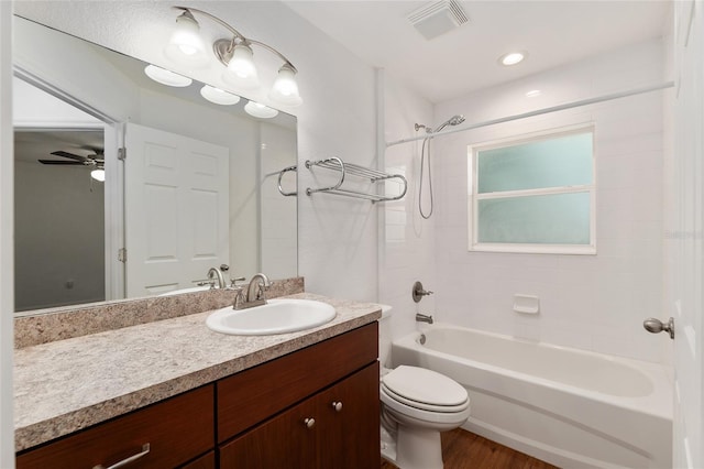 5740 NW 61st St, Ocala, FL 34482 - full bath with bathing tub / shower combination, vanity, wood finished floors, and a ceiling fan
