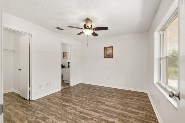 3640 SE 131st Ln, Belleview, FL 34420 - spare room featuring wood finished floors, ceiling fan, and a textured ceiling