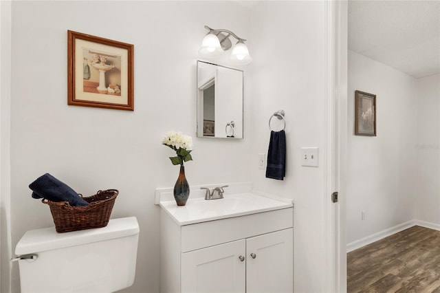 3640 SE 131st Ln, Belleview, FL 34420 - bathroom with vanity and wood finished floors