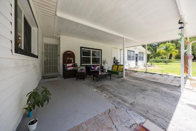 2340 NE 14th Ave, Ocala, FL 34470 - view of patio with a carport and an outdoor hangout area
