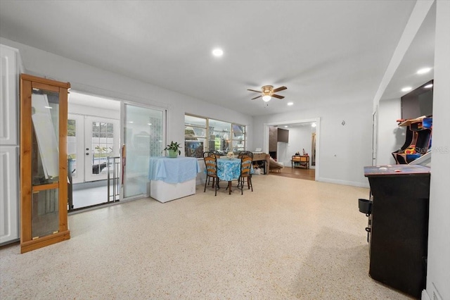 2340 NE 14th Ave, Ocala, FL 34470 - living room featuring french doors, healthy amount of natural light, speckle patterned floor, and recessed lighting