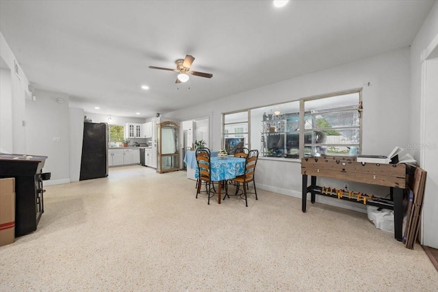 2340 NE 14th Ave, Ocala, FL 34470 - dining room with dark speckled floor, ceiling fan, and recessed lighting