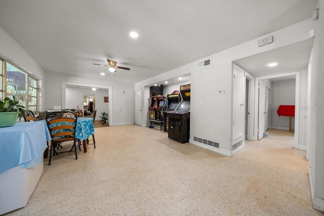 2340 NE 14th Ave, Ocala, FL 34470 - living area featuring ceiling fan, speckled floor, and recessed lighting