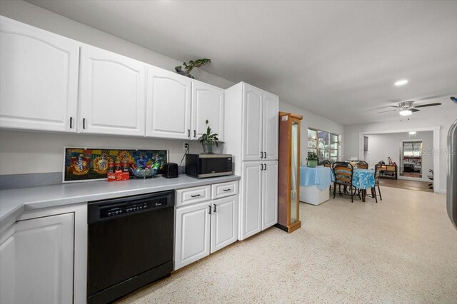 2340 NE 14th Ave, Ocala, FL 34470 - kitchen featuring black dishwasher, stainless steel microwave, white cabinets, ceiling fan, and light countertops