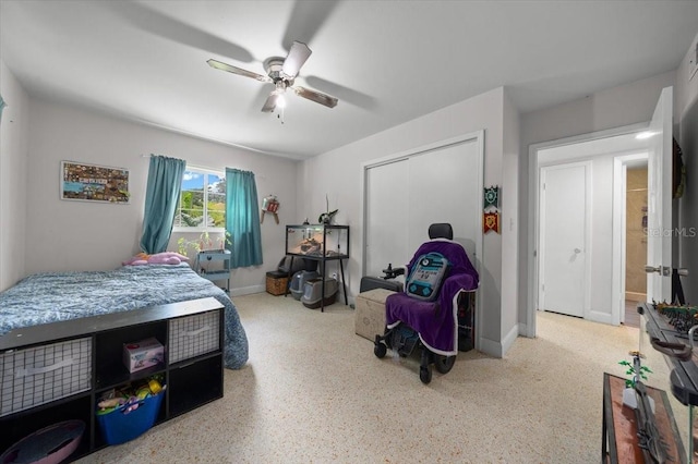 2340 NE 14th Ave, Ocala, FL 34470 - bedroom featuring a closet, ceiling fan, and speckle patterned floor