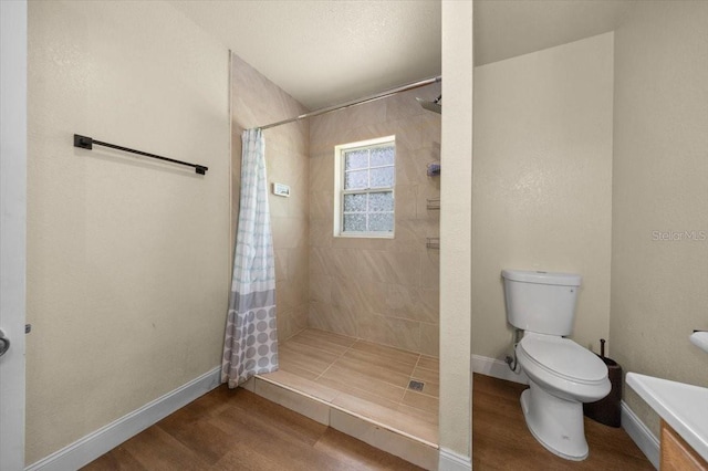 2340 NE 14th Ave, Ocala, FL 34470 - full bath featuring tiled shower, wood finished floors, and vanity