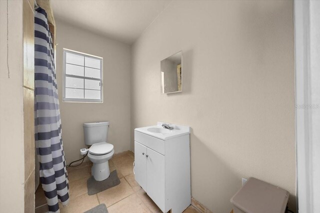 2340 NE 14th Ave, Ocala, FL 34470 - bathroom featuring vanity, tile patterned floors, and a shower with shower curtain