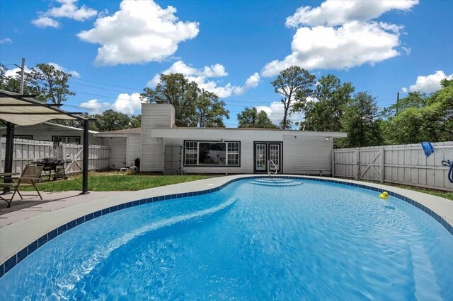 2340 NE 14th Ave, Ocala, FL 34470 - view of pool featuring a fenced backyard and a patio area