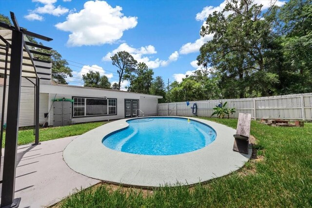 2340 NE 14th Ave, Ocala, FL 34470 - view of pool with a fenced backyard and a patio area