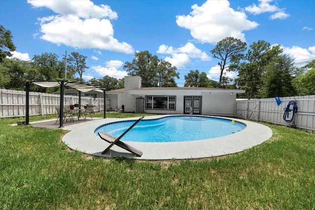 2340 NE 14th Ave, Ocala, FL 34470 - view of swimming pool featuring a patio, a fenced backyard, and french doors