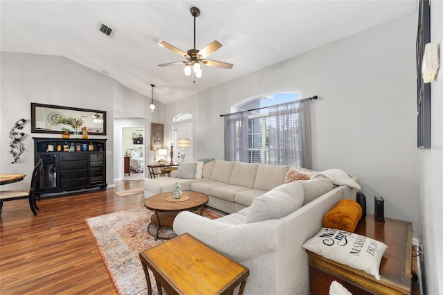 6362 N Walter Ter, Citrus Springs, FL 34434 - living area featuring wood finished floors, ceiling fan, and lofted ceiling