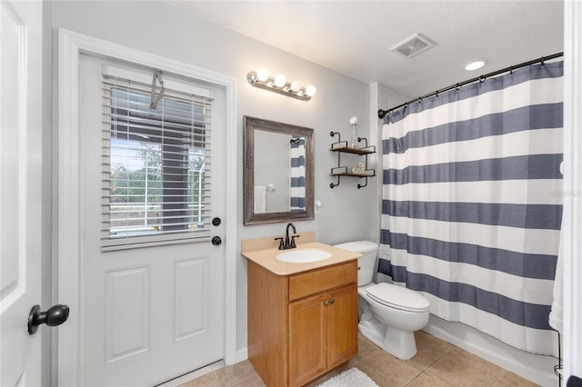 6362 N Walter Ter, Citrus Springs, FL 34434 - full bath with tile patterned flooring, vanity, a textured ceiling, and a shower with curtain