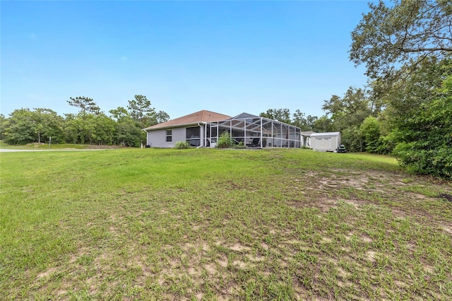 6362 N Walter Ter, Citrus Springs, FL 34434 - view of grassy yard featuring a shed and a lanai