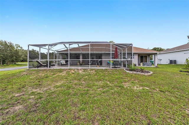 6362 N Walter Ter, Citrus Springs, FL 34434 - rear view of house with a lawn and a lanai