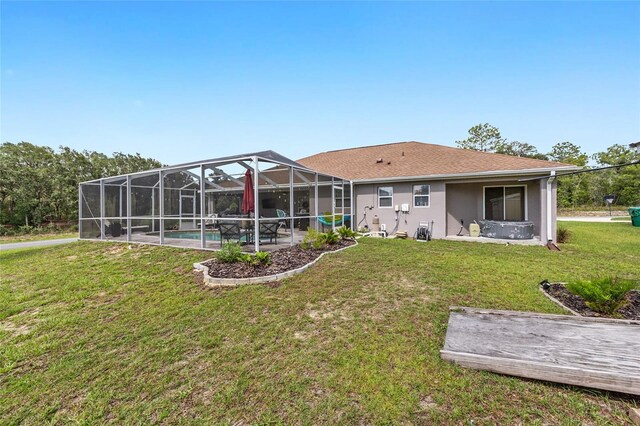 6362 N Walter Ter, Citrus Springs, FL 34434 - rear view of house featuring a yard, an outdoor pool, glass enclosure, and stucco siding