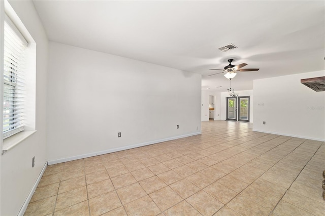 5500 SE 2nd Pl, Ocala, FL 34480 - spare room featuring a ceiling fan and light tile patterned flooring