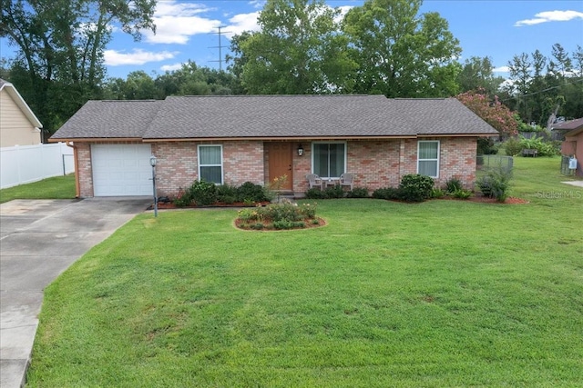 5525 NE 22nd Ave, Ocala, FL 34479 - ranch-style home featuring brick siding, concrete driveway, an attached garage, and roof with shingles