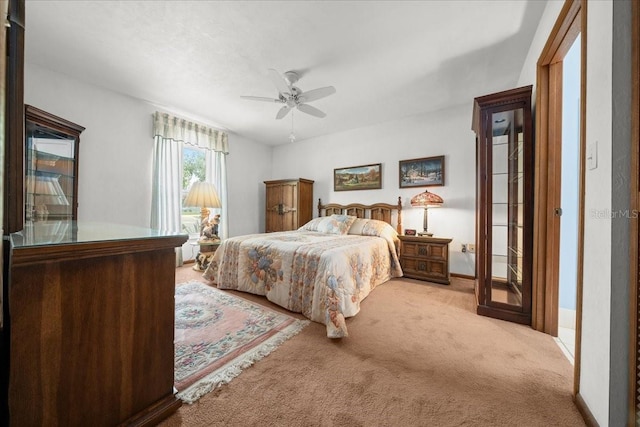 5525 NE 22nd Ave, Ocala, FL 34479 - bedroom with carpet floors and a ceiling fan
