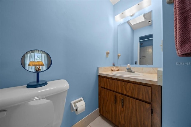 5525 NE 22nd Ave, Ocala, FL 34479 - full bathroom with vanity, tile patterned floors, a shower, and a skylight