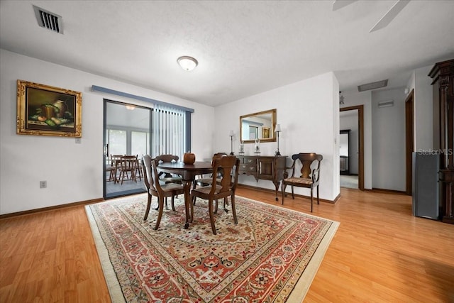 5525 NE 22nd Ave, Ocala, FL 34479 - dining room featuring light wood finished floors and ceiling fan