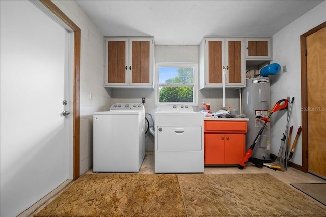 5525 NE 22nd Ave, Ocala, FL 34479 - washroom with water heater, washer and dryer, and cabinet space