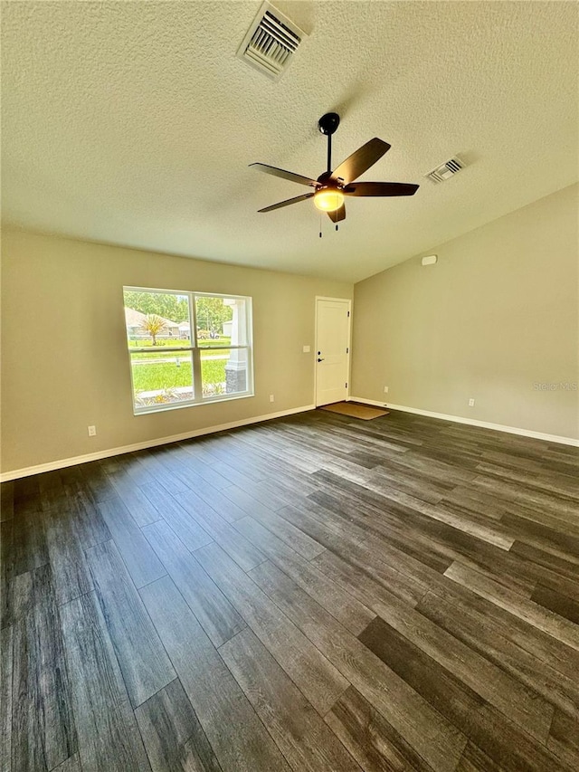 13305 SW 114th Pl, Dunnellon, FL 34432 - spare room with a ceiling fan, dark wood-style flooring, and a textured ceiling