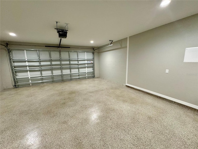 13305 SW 114th Pl, Dunnellon, FL 34432 - garage with a garage door opener, recessed lighting, and concrete block wall