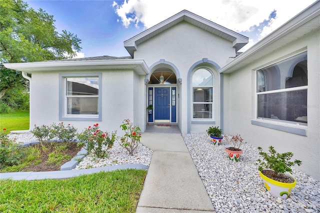 6330 SW 117th Loop, Ocala, FL 34476 - property entrance with stucco siding
