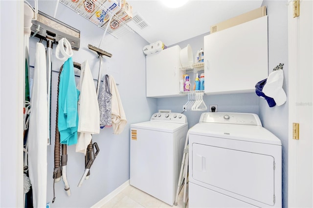 6330 SW 117th Loop, Ocala, FL 34476 - washroom featuring washing machine and clothes dryer and cabinet space