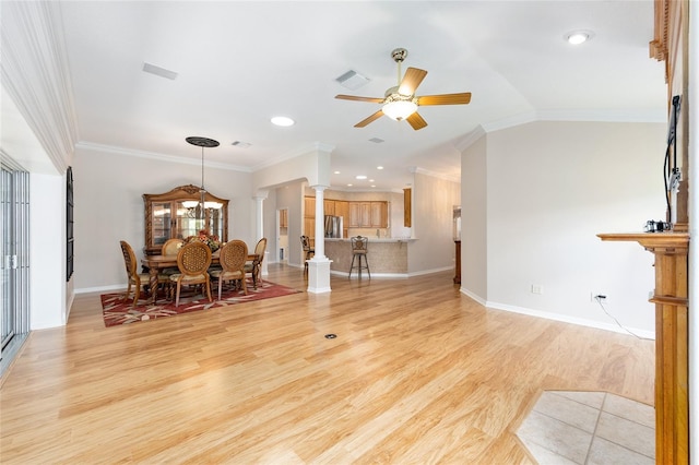 7243 SE 172nd Legacy Ln, The Villages, FL 32162 - living area featuring decorative columns, a ceiling fan, light wood-type flooring, crown molding, and recessed lighting